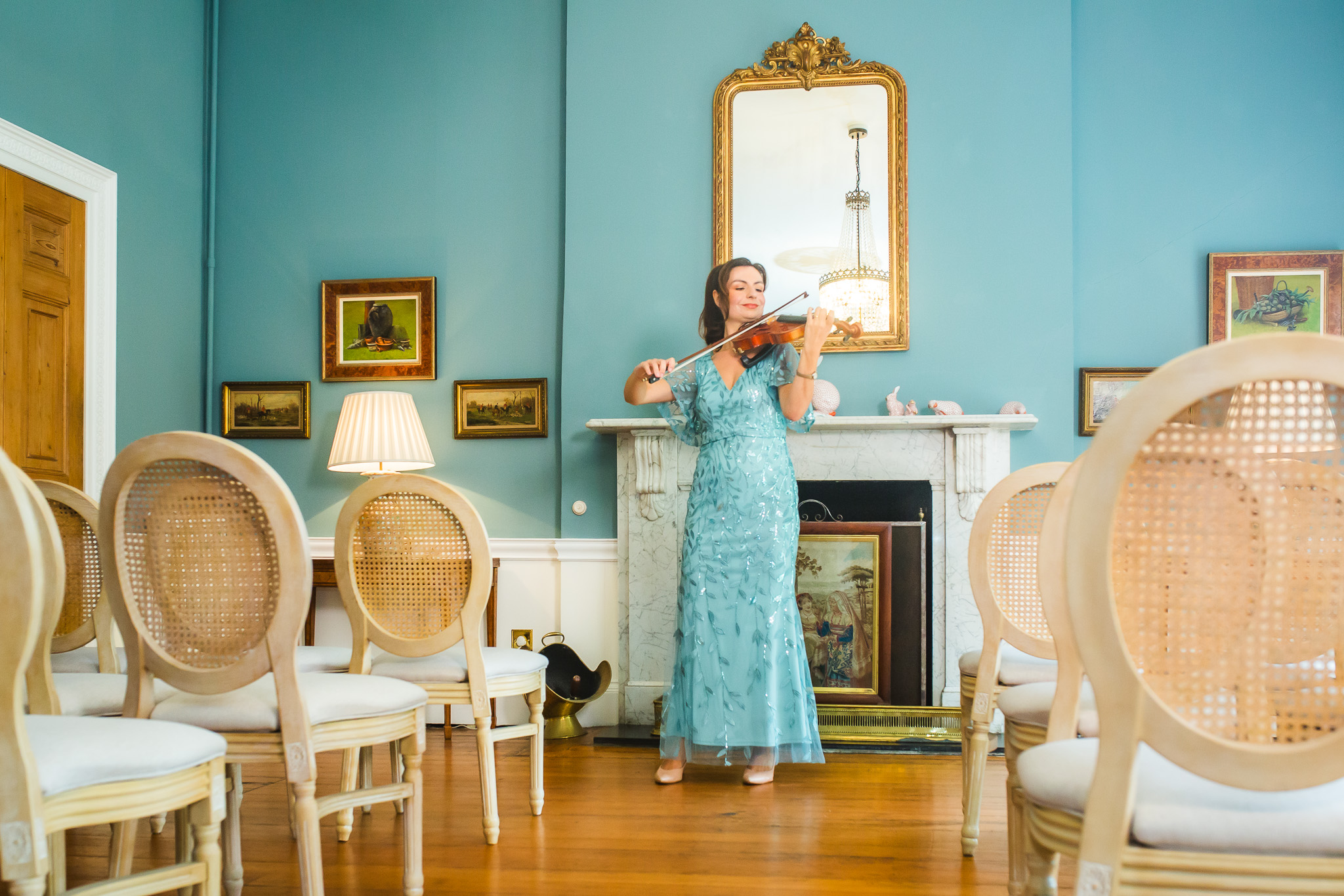 Karina dey violin playing at a wedding ceremony at the Stone House Estate